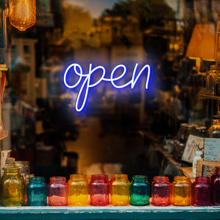 Vintage blue neon "Open" sign