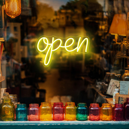 Vintage golden yellow neon "Open" sign
