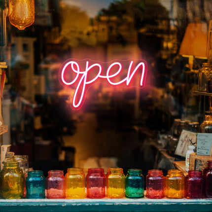 Vintage light pink neon "Open" sign