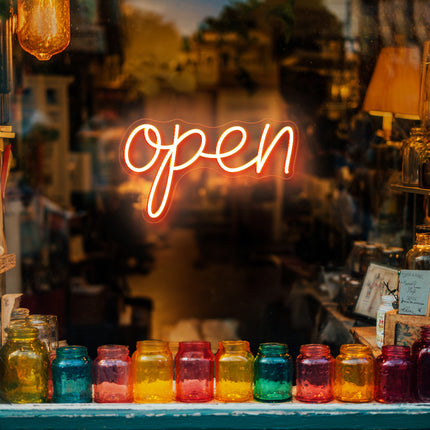 Vintage orange neon "Open" sign