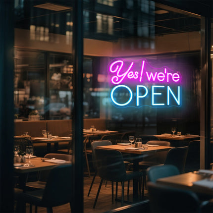 Pink & ice blue Yes! We're Open Neon Sign